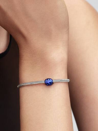 Mini Charm Conchiglia effetto metallico blu